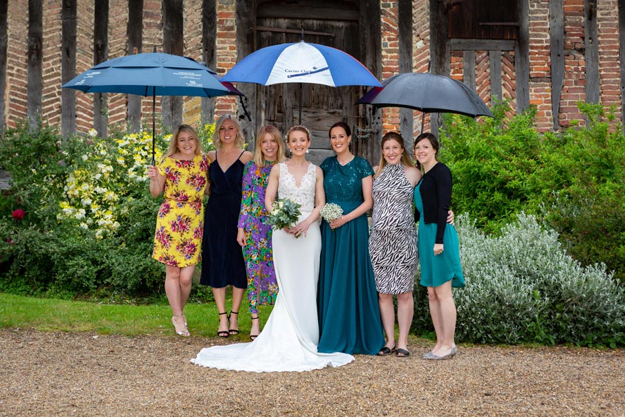 Group shot in the rain at Colville Hall,