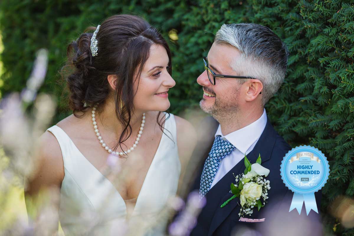Newly married couple on their wedding day at The White Hart at Great Yeldham