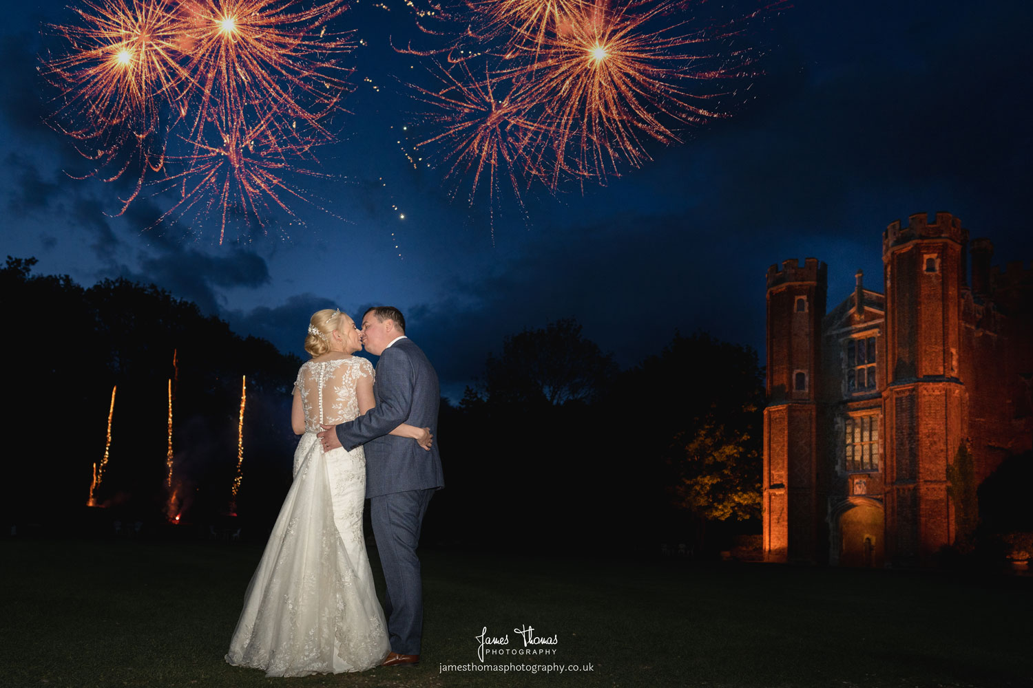 Bride and Groom watching fireworks at Leez Priory wedding venue