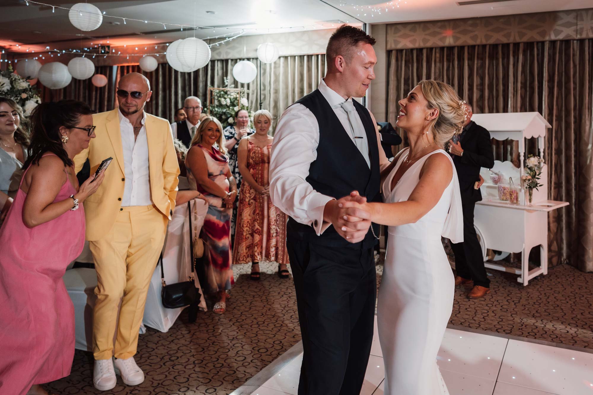 Bride and Groom at night outside Layer Marney Tower